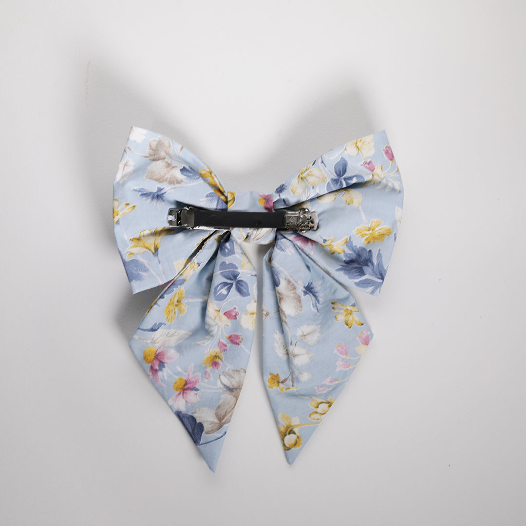 Women's hair bow in blue florals