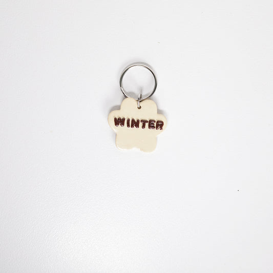 Paw print pet tag